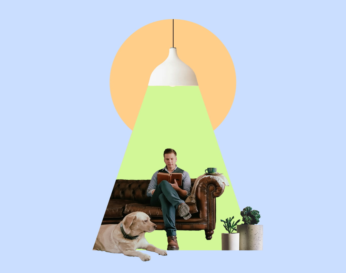 Man reading on couch with a dog